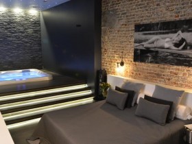 Apartment Jacuzzi et Sauna 6H - Bedroom